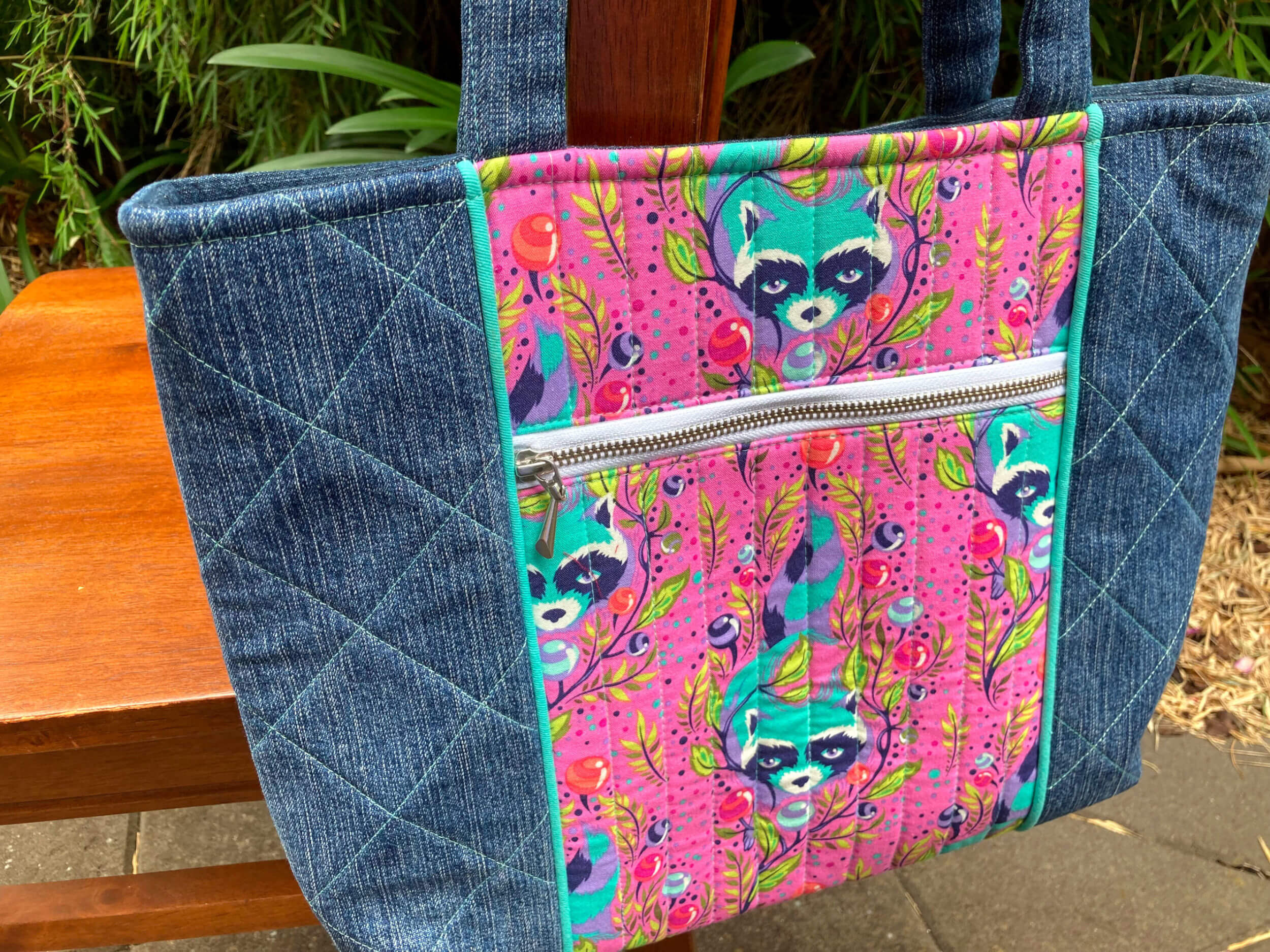 Pelican Tote - Denim with Seafoam Raccoon - Front