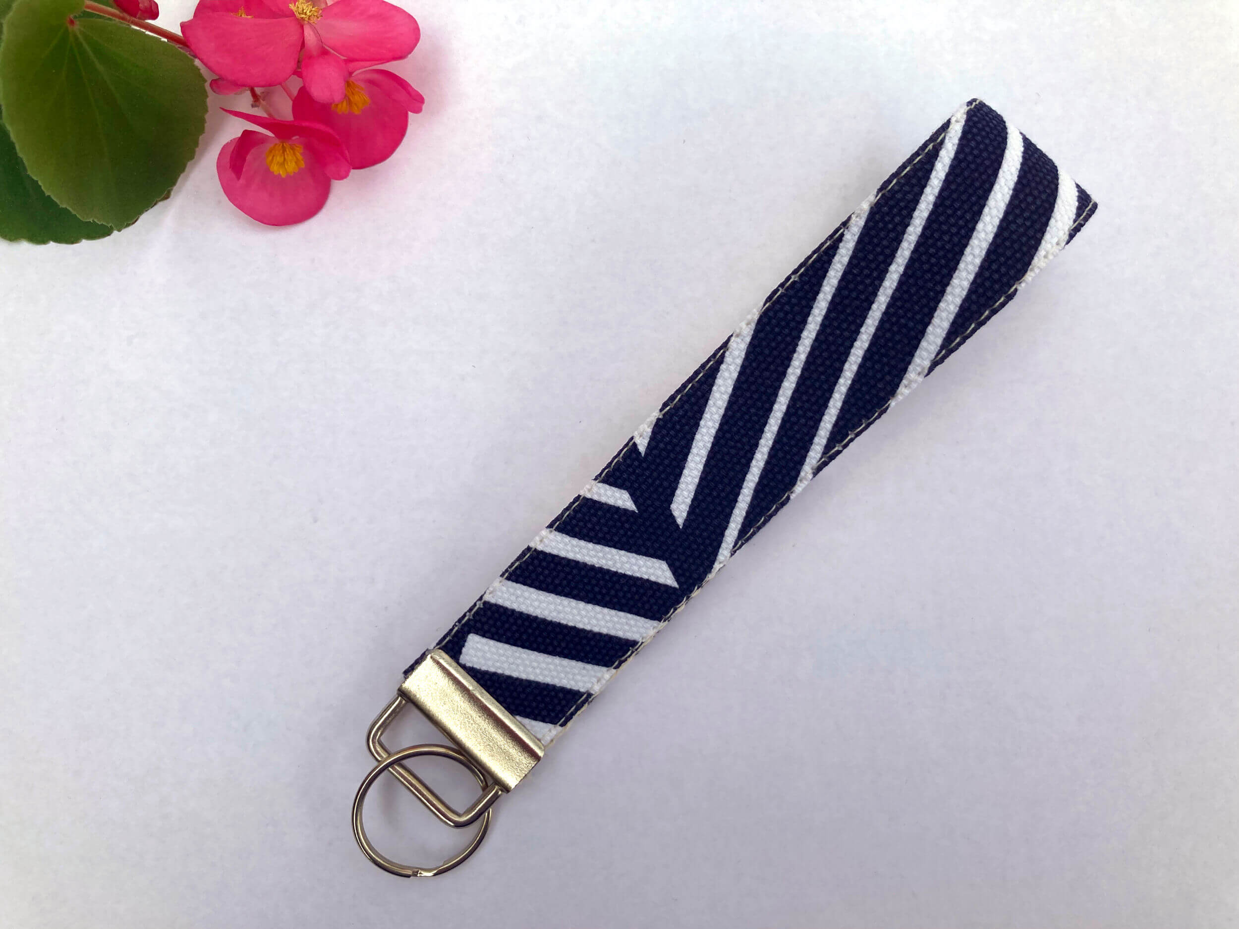 Navy and White Striped Key fob on a white background by Sapphorium